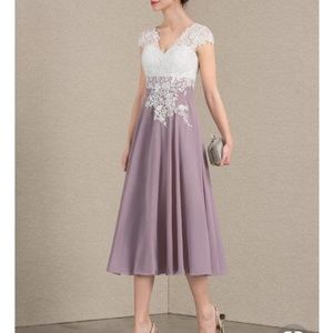 Mother of the bride dress never worn.